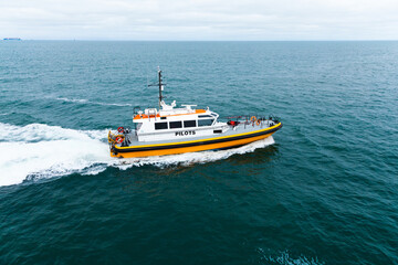 Naklejka premium Pilot offshore ship at sea in motion.