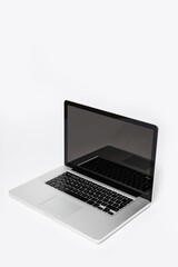 Modern laptop computer with blank screen on white background