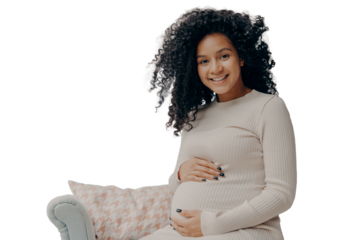 Beautiful pregnant african woman enjoying pregnancy, spending time at home