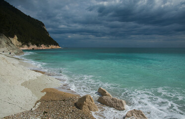 Beautiful coastline of Sassi Neri beach in riviera del Conero. Sirolo, Italy