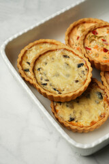 Vegetable tartlets with mushrooms, paprika, salmon