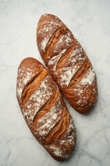 Fresh baguette bread, close-up. French loaf of bread