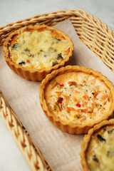 Vegetable tartlets with mushrooms, paprika, salmon