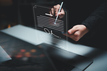 Electronic signature concept, business people sign electronic documents on digital documents, paperless office, future business contract signing.	
