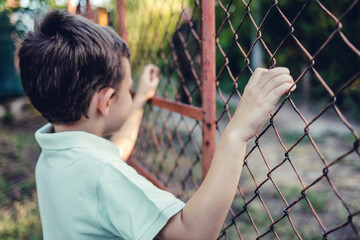 Happy military father meeting with son after mission. Dad returns home from overseas military assignment.
