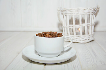 A cup of aromatic fresh natural coffee beans