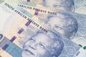 Nelson Holilala Mandela faces on South African money 100 rand banknotes macro.President of South Africa.