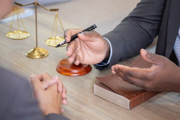Law Consulting, Agreements, Contracts, African American attorneys provide legal advice and sign contracts as grievance attorneys for clients, Concept lawyers.