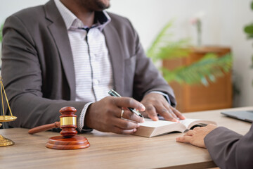 Law Consulting, Agreements, Contracts, African American attorneys provide legal advice and sign contracts as grievance attorneys for clients, Concept lawyers.