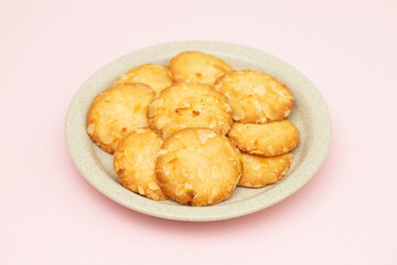 Few homemade cookies with almond on small dish