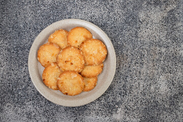Few homemade cookies with almond on small dish