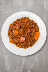 Lentils with chorizo and carrot. Typical Spanish recipe.