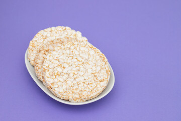 Few crunchy rice cakes on white dish