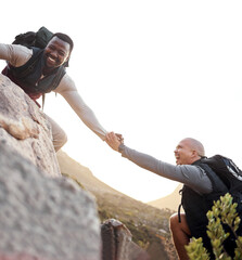 A helping hand. Cropped shot of a handsome young man helping his friend along a mountain during...