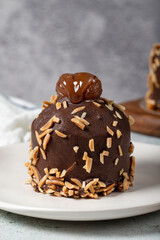 Chestnut and chocolate cake. Delicious cake with cream filling. Studio shoot. Bakery products. Close up