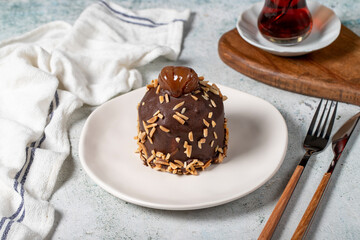 Chestnut and chocolate cake. Delicious cake with cream filling. Studio shoot. Bakery products