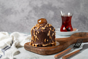 Chestnut and chocolate cream cake. Delicious cake with cream filling. Studio shoot. Bakery products