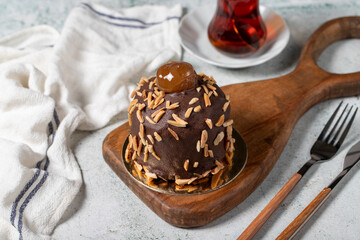 Chestnut and chocolate cream cake. Delicious cake with cream filling. Studio shoot. Bakery products