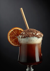 Chocolate cocktail with whipped cream sprinkled with chocolate chips.