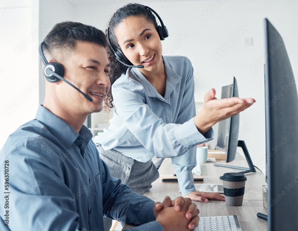 Aufkleber Using the right methods and tools to accurately assist customers. Shot of two call centre agents working together on a computer in an office.