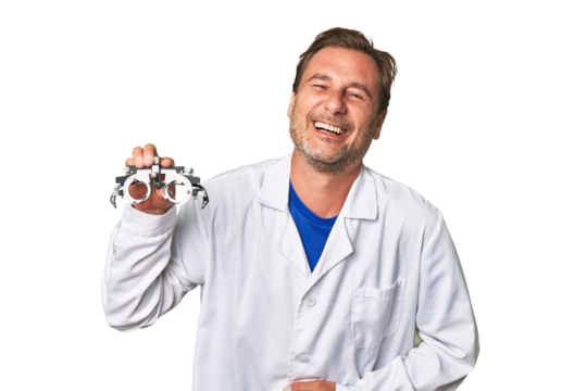 A middle-aged optometrist man laughing and having fun.