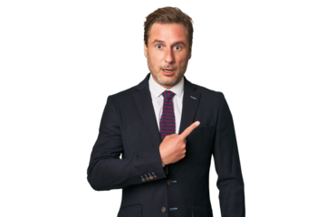A middle-aged businessman isolated pointing to the side