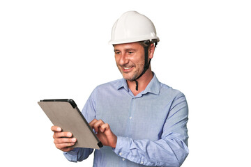 Tech-savvy architect using tablet for work, studio shot.