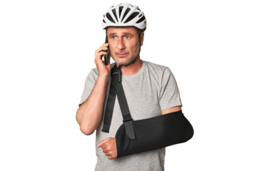 Studio portrait captures man's vulnerable moment after bicycle accident.