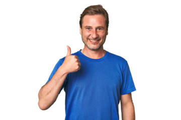 A middle-aged man isolated smiling and raising thumb up