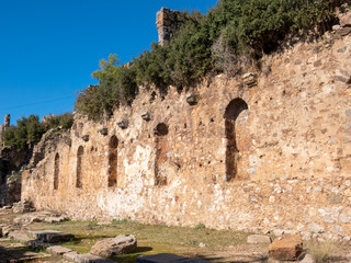 The ruined wall of antique building in the ancient city of Syedra, South Turkey