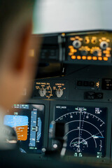 Fototapeta na wymiar Close-up of an airplane cockpit Center panel with main flight display and navigation display Airplane pilot panels