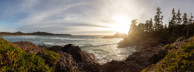 Rocky Shore on West Coast of Pacific Ocean in Tofino. Cox Bay in Vancouver Island, British Columbia, Canada. Sunset Sky. Nature Panorama
