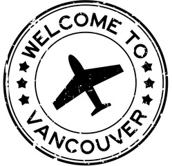 Naklejka premium Grunge black welcome to vancouver word with plane icon round rubber seal stamp on white background