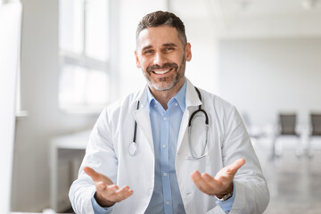 Patient's point of view of consultation with doctor, doc talking to camera, gesturing, explaining treatment to patient