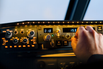 A detailed shot of the control panel in the cockpit of the passenger plane Boeing 737 flight simulator