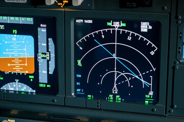 A detailed shot of the radar control and navigation panel in the cockpit of the Boeing 737 Flight Simulator plane