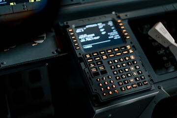 A detailed shot of the control and navigation panel in the cockpit of a Boeing 737 Flight Simulator passenger plane