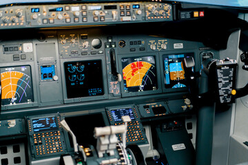 A detailed shot of the radar control and navigation panel in the cockpit of the Boeing 737 Flight...