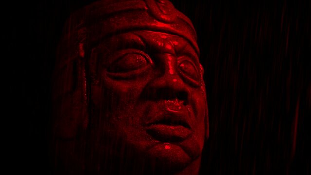 Aztec Statue In Rain Scary Blood Red