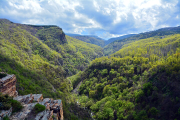 Fototapeta na wymiar View to the river from Momini skali near the village of Izvor in spring