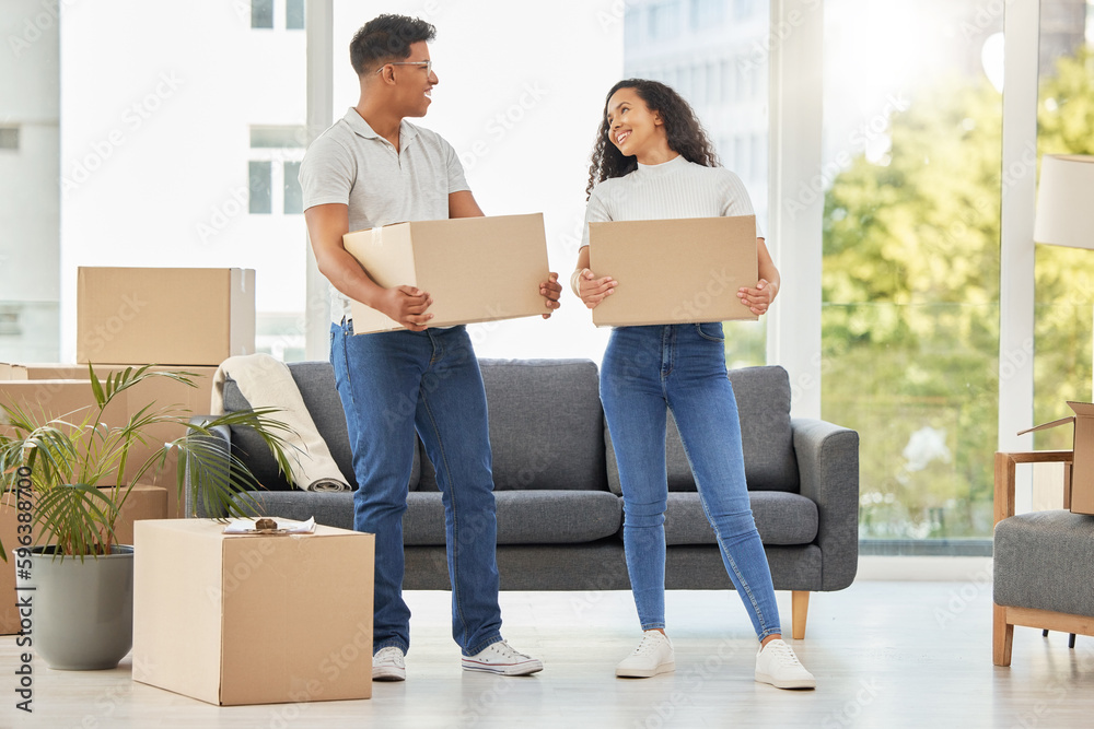 Canvas Prints Its time for the move. Shot of a young couple moving into their new house.