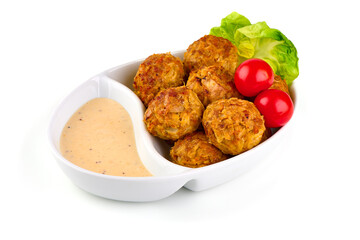 Baked ikea meatballs, isolated on white background.