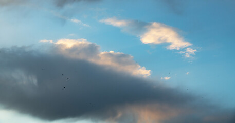 Beautiful bright orange sunset sky with clouds. Sunset sky with clouds background.