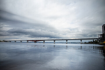 Bridge over the river in the city, urban landscape.