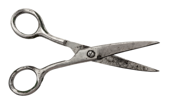 Old retro rusty tailor's scissors on a white background. Sewing accessories