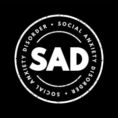 SAD Social Anxiety Disorder - type of anxiety disorder that causes extreme fear in social settings, acronym text concept stamp