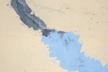 Traces of cement mortar on a yellow wall. Repair