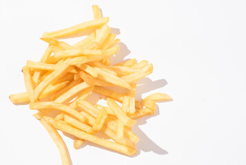 French fries on white background, junk food . Fatty food studio shoot. Food photo fo menu ,banners design
