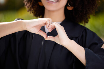 Stay dignified, no matter how qualified. Closeup shot of an unrecognisable woman making a heart shape with her hands on graduation day.