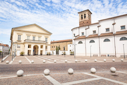 Vittorio Emanuele II Square with the theater and the church of the Holy Cross in Mortara, Province of Pavia, region of Lombardy, Italy 
